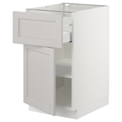 White SEKTION kitchen cabinet with drawer and shelves.