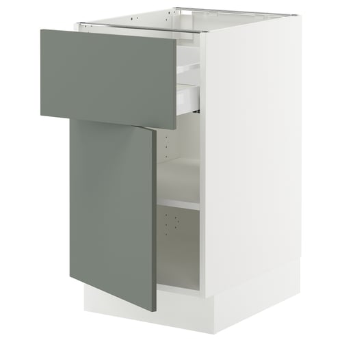 SEKTION kitchen cabinet with grey-green door, white base, and adjustable shelves.