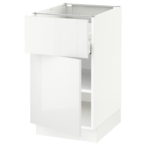 A white SEKTION kitchen cabinet with a glossy finish and an open door.