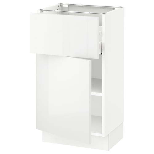 Missing its door, this high-gloss white cabinet stands tall with one shelf exposed. Modern and minimalist, its ready for any kitchen.
