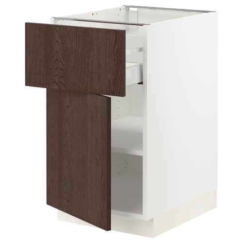 White kitchen cabinet with dark brown wooden drawer and door, featuring adjustable shelves and modern design.