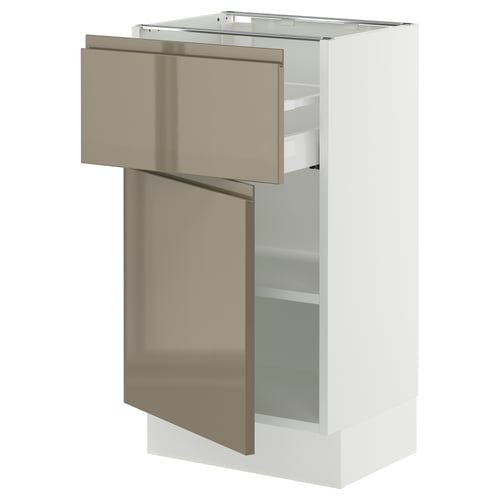 White SEKTION kitchen cabinet with brown glass doors and drawers.