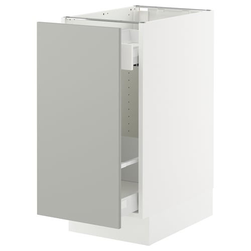 A white SEKTION cabinet from IKEA, featuring a modern design with a smooth, light grey door and a sturdy frame construction.