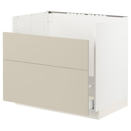 Image description: SEKTION kitchen unit in beige with smooth surfaces and metallic drawer runners.