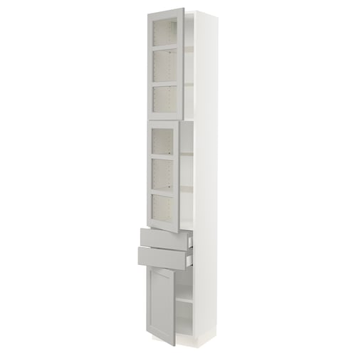 White kitchen cabinet with glass doors and drawers.