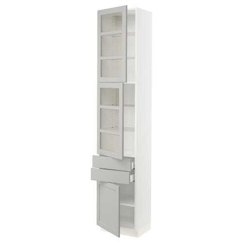 White SEKTION kitchen cabinet with adjustable shelves and soft-closing drawers.