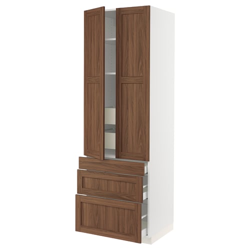 SEKTION kitchen unit in walnut. Tall, white main body with wooden drawers and doors, silver handles.