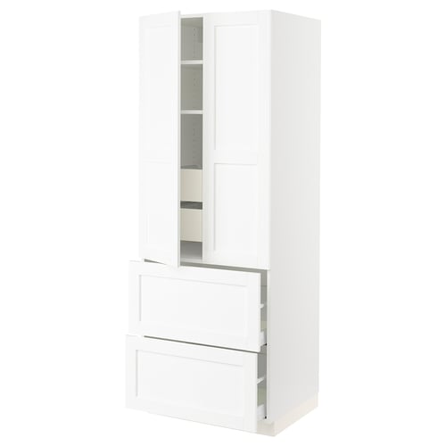 A white SEKTION tall kitchen cabinet with one open door, featuring shelves inside.