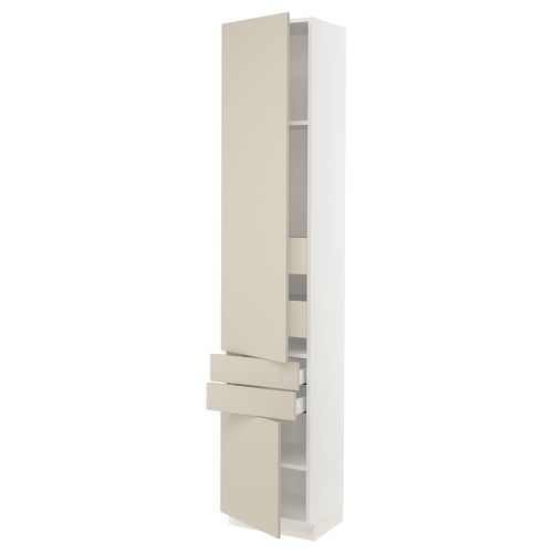 A SEKTION kitchen cabinet with beige havstorp fronts, featuring adjustable shelves and soft-close hinges.