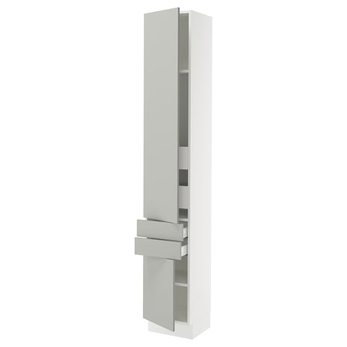 A white SEKTION cabinet with a sleek grey handle and shelves. Its tall, rectangular, and modern with adjustable shelves.