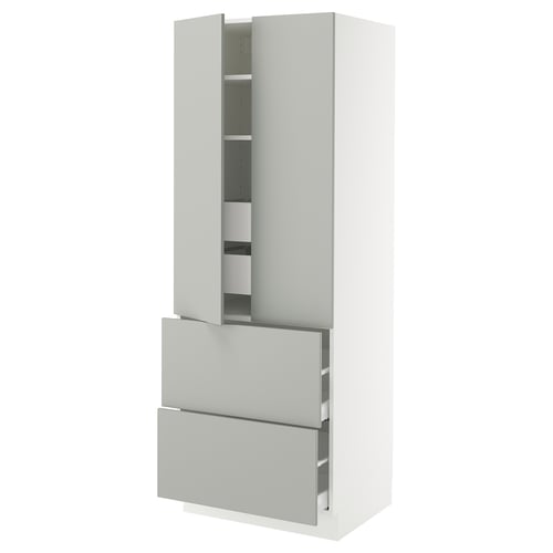 A white SEKTION kitchen cabinet with grey drawers and shelves. It has a modern, clean, and minimalist design, with a tall and slim shape.