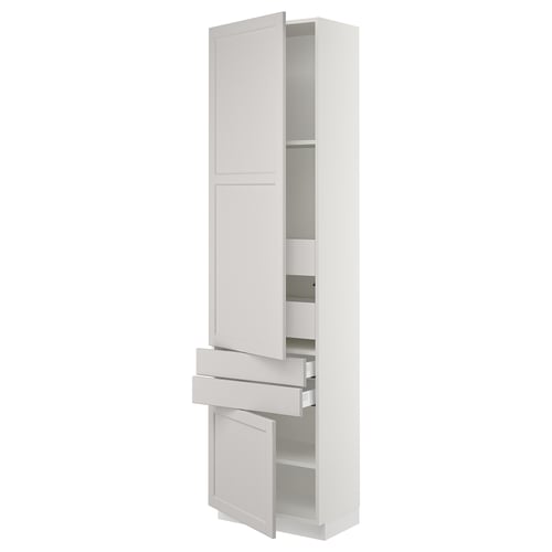 White SEKTION kitchen cabinet with bevelled edges, adjustable shelves, and soft-closing drawers.