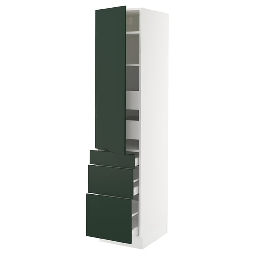 White tall kitchen cabinet with dark green drawers and door.