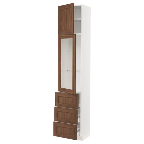 A SEKTION kitchen cabinet with walnut finish, combining white and wooden drawers, shelves, and glass doors.