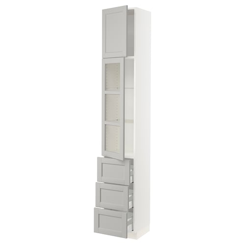 A white SEKTION kitchen cabinet with light grey glass doors and drawers. It has an adjustable shelf and a sleek, modern design.