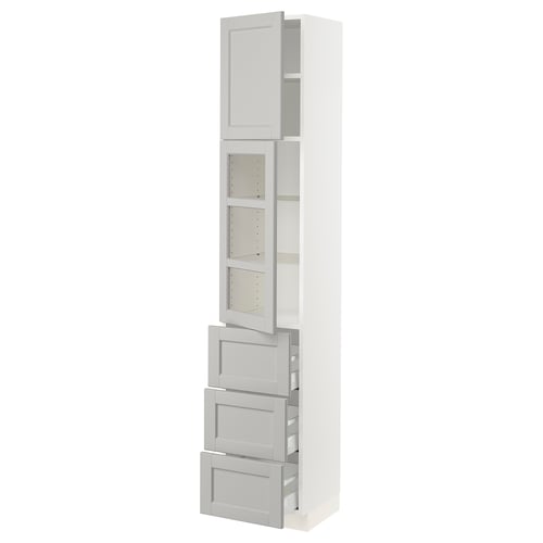 This image shows the SEKTION kitchen cabinet in white with light grey glass doors. It multiple shelves and drawers with a classic, traditional design.