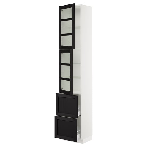An ikea SEKTION kitchen cabinet with black-stained glass doors and a white frame. Its tall with adjustable shelves and drawers.