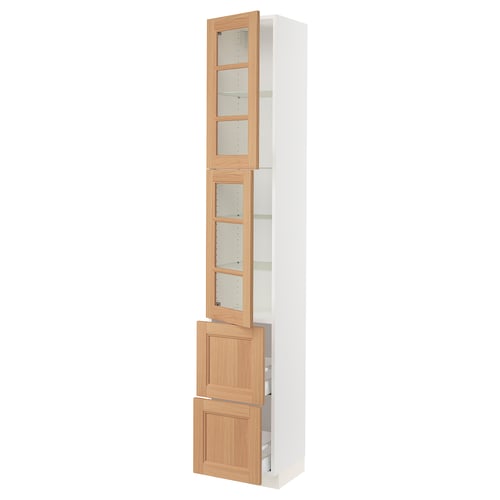An SEKTION kitchen cabinet in white with wooden doors and glass inserts. The cabinet is tall with adjustable shelves and drawers.