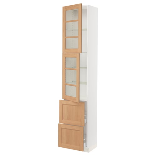 SEKTION kitchen cabinet in white with oak doors. Tall and slim, featuring glass shelves and drawers. Modern, elegant design.
