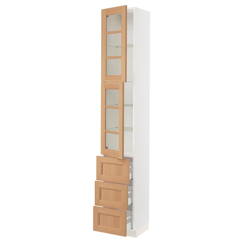 SEKTION kitchen cabinet in white with oak drawers and glass doors.