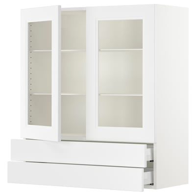White kitchen cabinet: SEKTION with glass doors, adjustable shelves, soft-closing drawers.