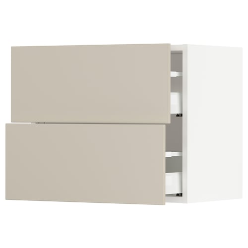 Depicts an off-white SEKTION kitchen cabinet set with two open drawers, showcasing modern design and soft-close drawer mechanisms.