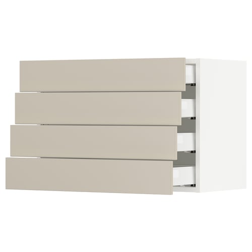 Displays a SEKTION kitchen cabinet in beige with four bevelled drawer fronts and smooth, clean design.