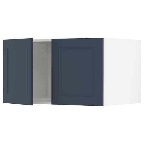 Blue kitchen cabinet with minimalist design. Two doors, one slightly open, revealing internal shelves. Clean, modern look.