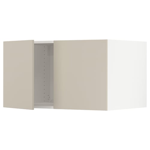SEKTION kitchen cabinets in beige with square panels and adjustable shelves.