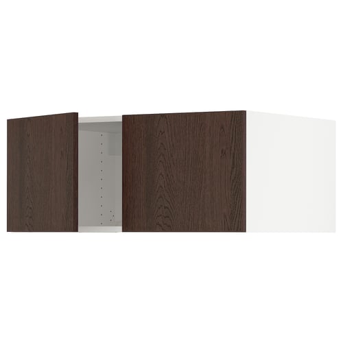 A dark brown wooden kitchen cabinet with an open door revealing shelves.
