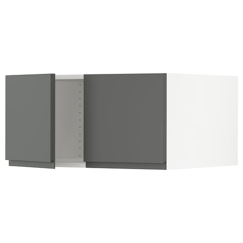 Modern kitchen cabinet, sleek design with no handles.