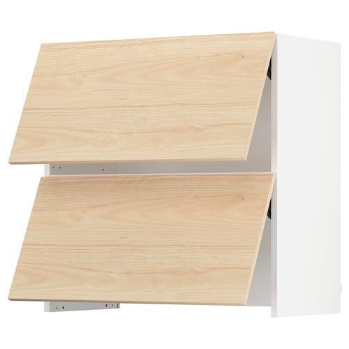Wooden kitchen cabinet with light ash finish and two openable flaps, mounted on a white wall.