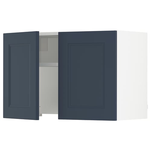 Blue kitchen cabinet with one open door, showcasing inner shelf. Modern design, made from particleboard and melamine foil.