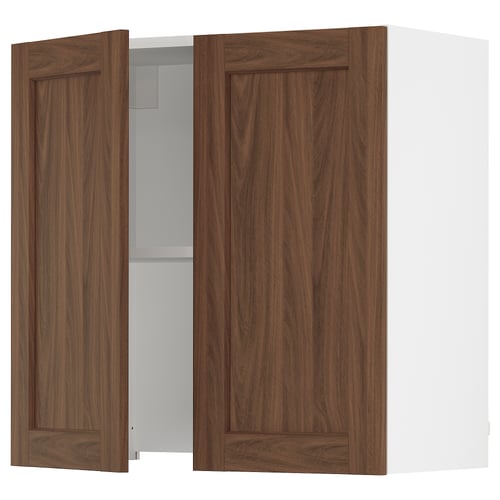 An open wooden cabinet from the SEKTION kitchen system in walnut with adjustable shelves and soft-closing hinges.