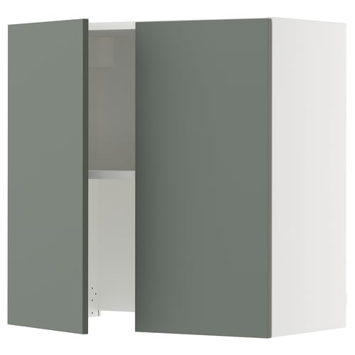 Grey-green kitchen cabinet with one door open, showing shelves. Modern and minimalist design.
