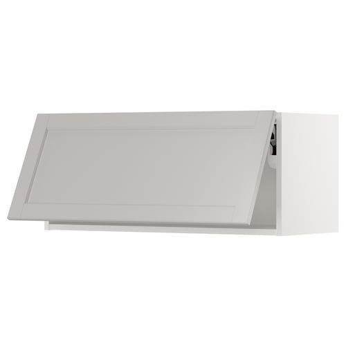 A white SEKTION kitchen cabinet with a sleek, modern design and bevelled edges.