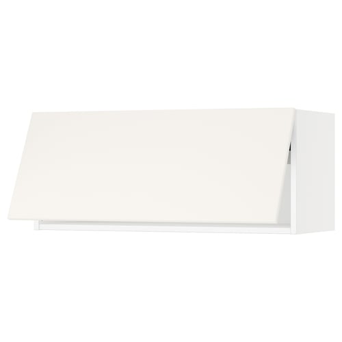 A white SEKTION wall cabinet from IKEA. Its rectangular, with smooth surfaces and a modern design, ideal for kitchen storage.
