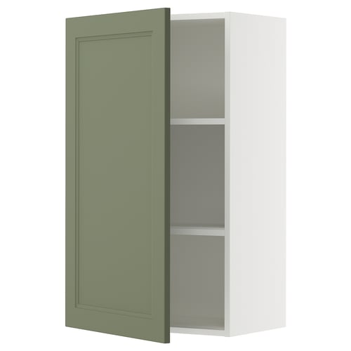 This image shows a green ikea SEKTION wall cabinet with one open door, gray interior, and adjustable shelves.