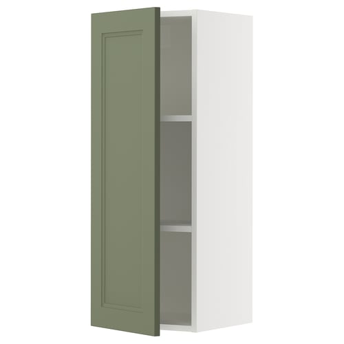 Depicts a SEKTION wall-mounted kitchen cabinet with a grey-green axstad door. It a sleek, rectangular design with a door damper for soft closing.