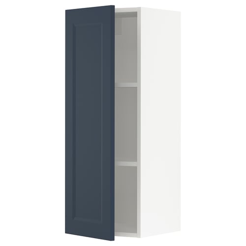 An open blue SEKTION kitchen cabinet from ikea with two shelves.