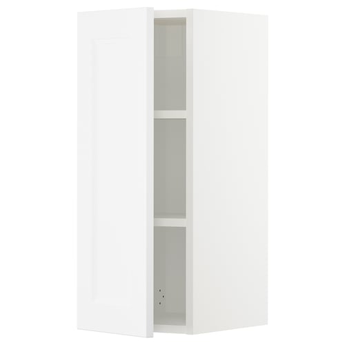 White SEKTION kitchen cabinet with white axstad front, adjustable shelves, and soft-close hinges.