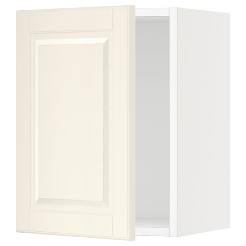 Off-white SEKTION kitchen cabinet with bevelled door, wall-mounted with snap hinges and door damper.