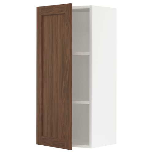 Ikea SEKTION walnut cabinet with open door, white frame, wood grain finish.