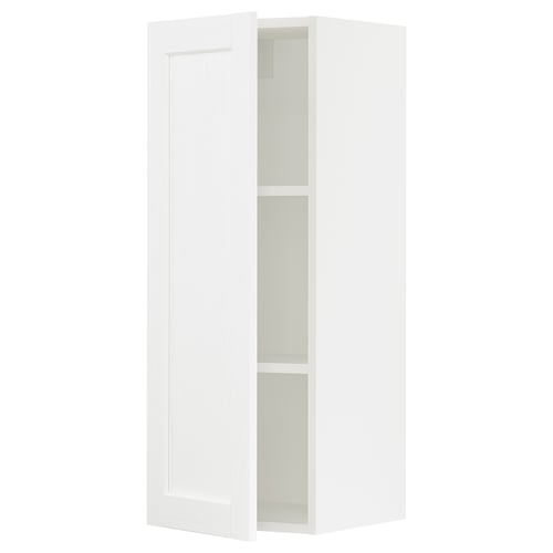White SEKTION kitchen cabinet with adjustable shelves and dampened hinge.