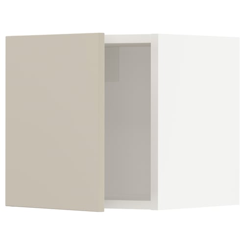 Beige SEKTION kitchen cabinet with soft-close hinge.