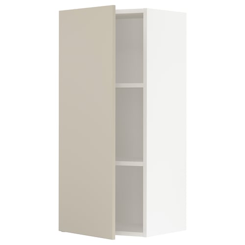 Modern beige kitchen cabinet with adjustable shelves and soft-close hinges.