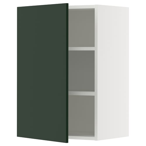 Green ikea SEKTION kitchen cabinet, one door open, white interior, sturdy frame.