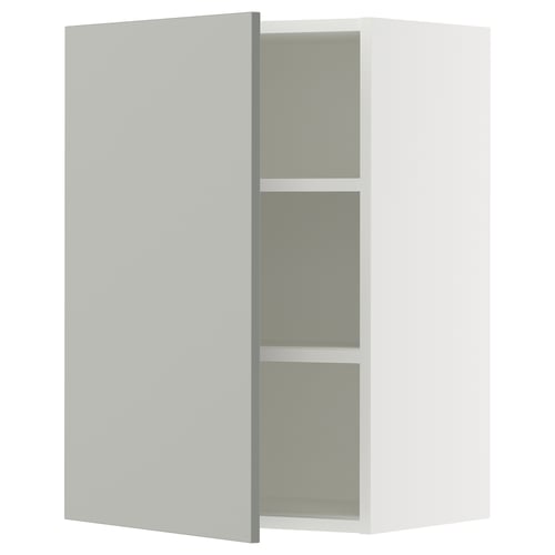 A grey SEKTION wall mount kitchen cabinet with two shelves and a door slightly open, revealing a modern, minimalist design.