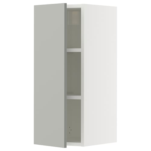 White SEKTION wall cabinet with grey glass shelf.