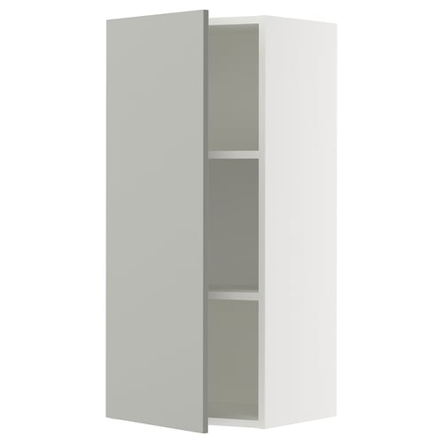 Ikea SEKTION light grey kitchen cabinet with adjustable shelves, modern clean design.